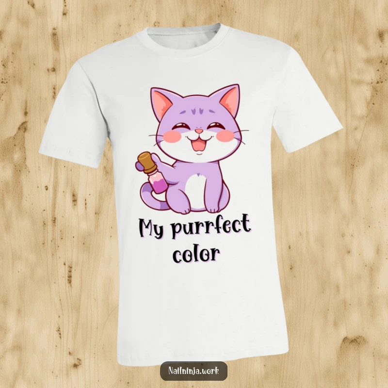 Funny giggling purple cat smiling wide, extending paw with nail polish bottle, on a t-shirt.